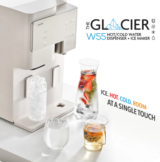 A compact water dispenser perfect for any kitchen in Singapore, featuring ice, a glass of iced water, a carafe with fruit, and a mug of tea. Text advertises hot, cold, and room temperature water at a single touch.