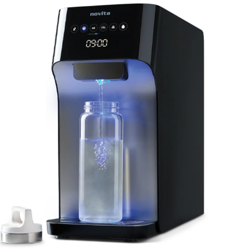 A compact water dispenser fills a clear bottle, creating a visible swirling motion in the water—ideal for any modern kitchen in Singapore. A white bottle cap is placed next to the dispenser.